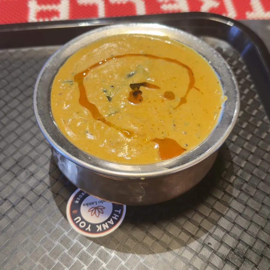 Butter chicken in a steel bowl
