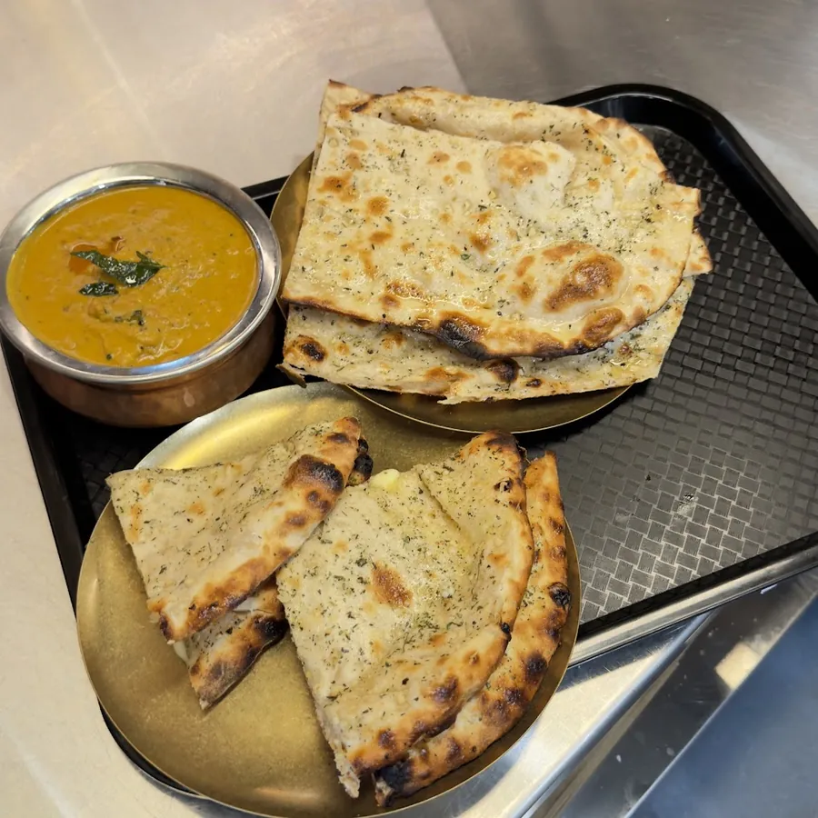 Garlic naan with a curry